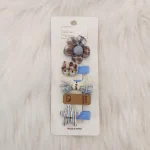 نما و بافت پارچه‌ای گیره مو طرح گل و پاپیون تور کد HC103